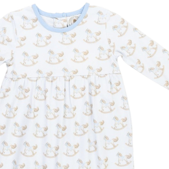 That Store Richmond Rocking Horse boys long-sleeve playsuit in white with a soft blue trim and gathered waist.