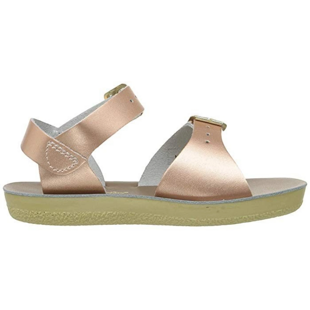 That Store rose gold leather surfer sandals with adjustable buckle straps and a flexible urethane outsole