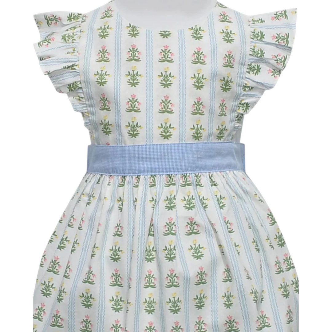 That Store sage green wildflower print sundress with angel wing sleeves and a blue gingham sash.