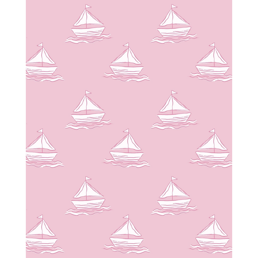 That Store girls swimsuit fabric featuring a repeating white sailboat pattern on a soft pink background