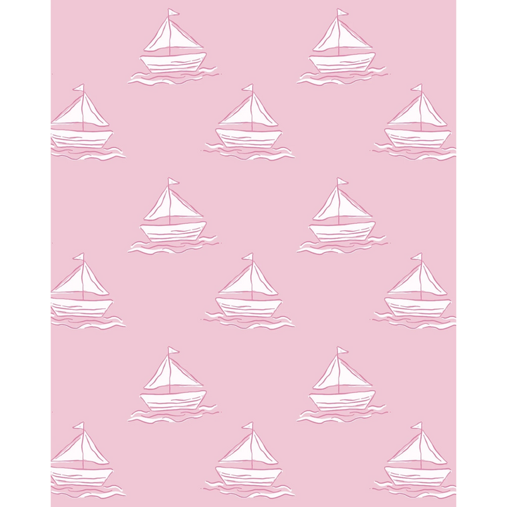 That Store girls swimsuit fabric featuring a repeating white sailboat pattern on a soft pink background