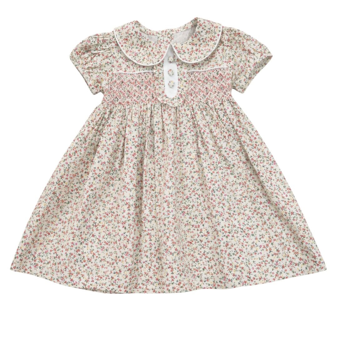 That Store Samantha floral print cotton dress for girls featuring classic chest smocking and a three-button placket.
