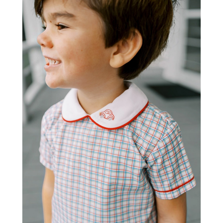 That Store Sibley boys short set in Raleigh Red plaid with a white Peter Pan collar and embroidered car detail.