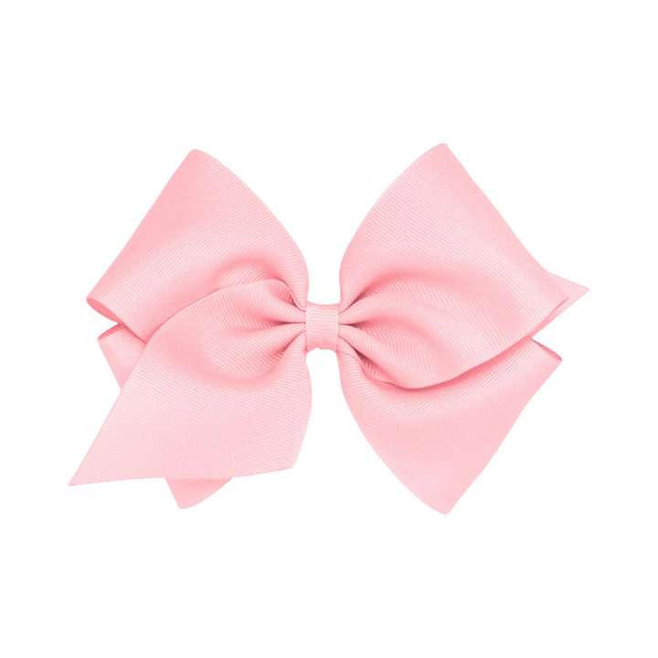 That Store small pink grosgrain hair bow with a patented no-slip alligator clip for toddlers and girls