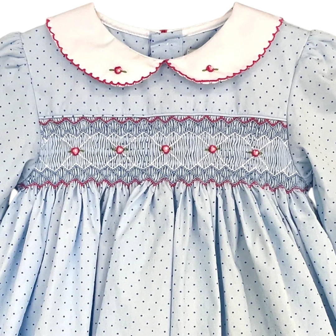 That Store girls blue cotton dress with dot print, hot pink smocking, flower embroidery, and white peter pan collar