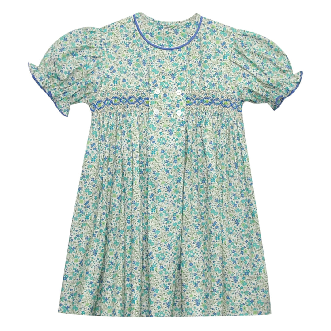 That Store smocked blue floral dress with puff sleeves, blue piping, and a double-breasted button front.