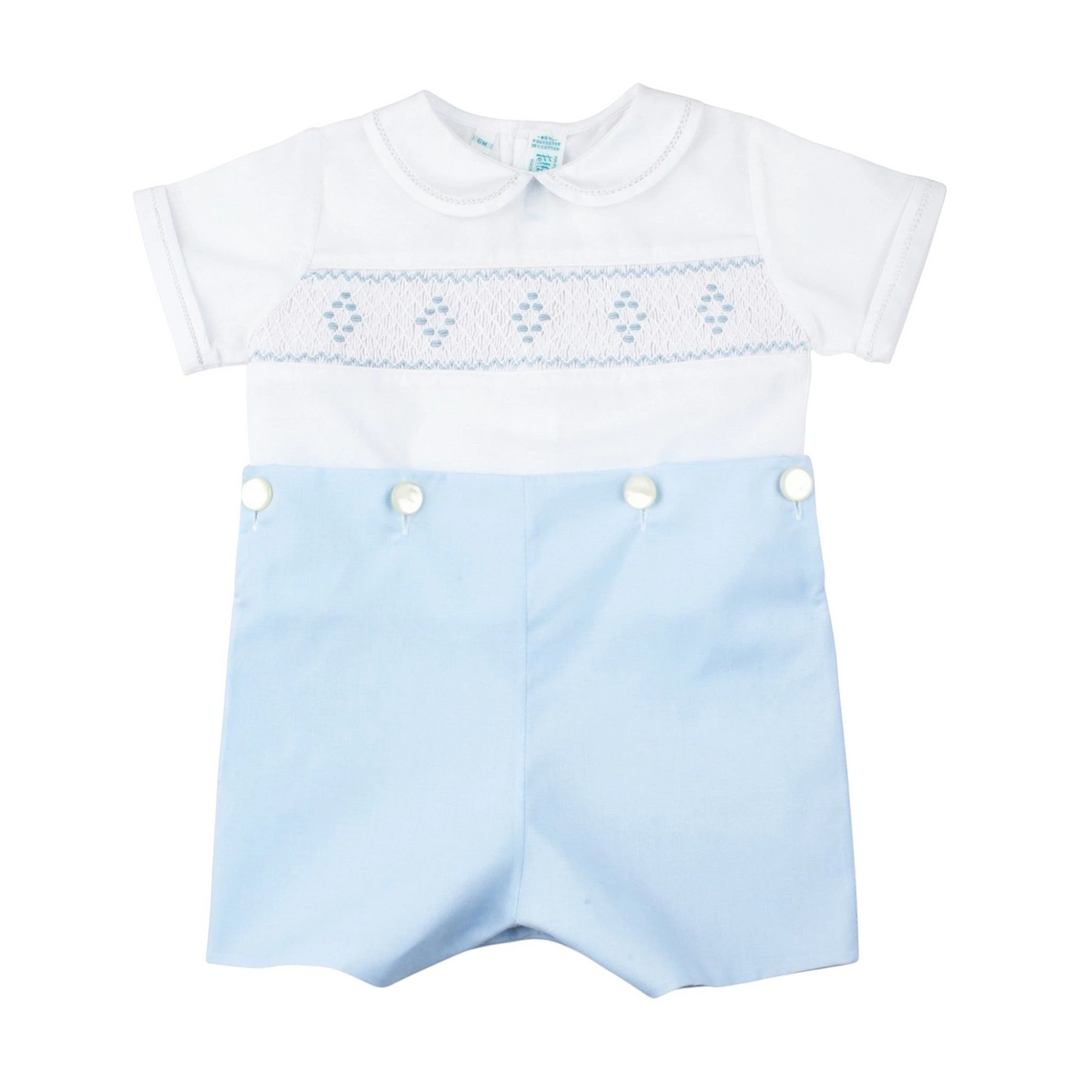 That Store boys bobby suit in white and blue with hand-smocked diamond embroidery, peter pan collar, and pearl buttons.