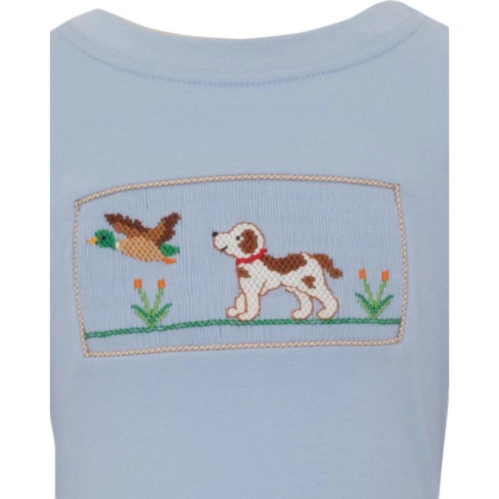 That Store blue cotton boys tee featuring a hand-smocked hunting dog and mallard duck design with gingham trim.