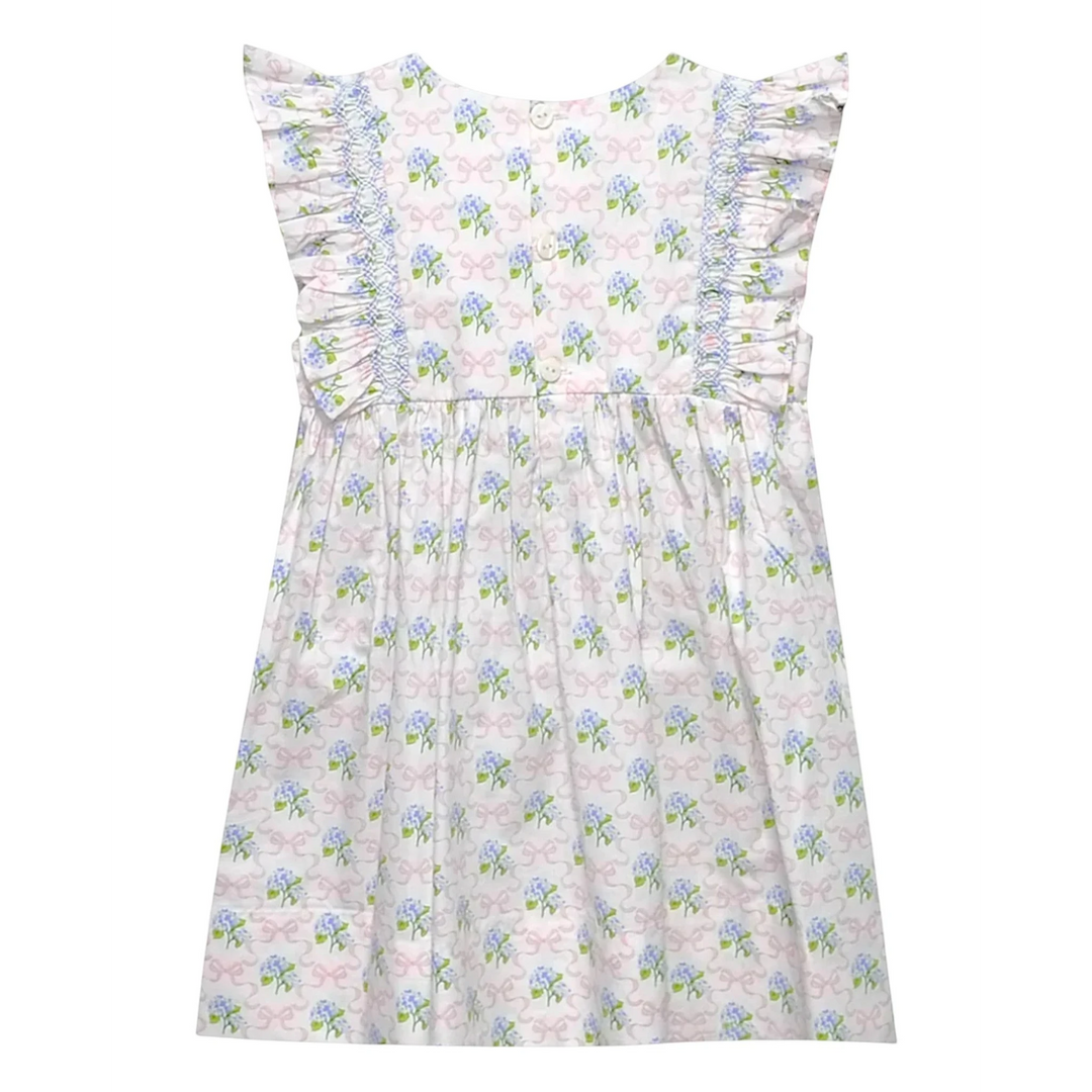 That Store girls smocked blue hydrangea and pink bow print dress with angel wing sleeves and back button closure