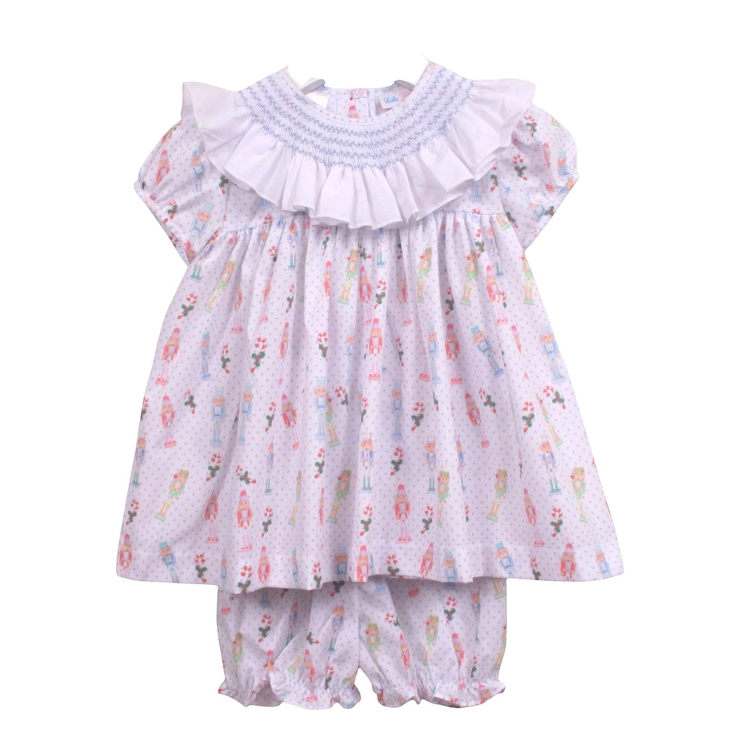 That Store girls bloomer set with smocked ruffled collar and nutcracker print on white fabric with blue dots
