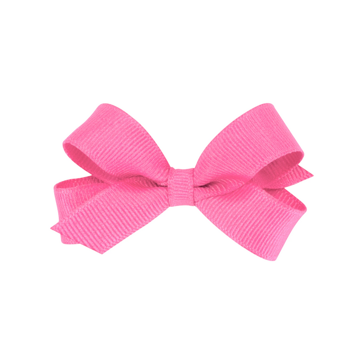 That Store tiny hot pink grosgrain hair bow on a WeeStay no-slip alligator clip