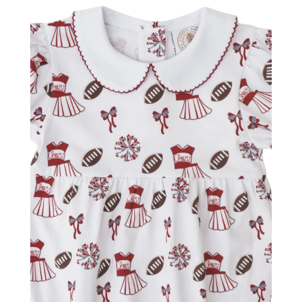That Store girls bubble featuring a dark red and white cheerleading and football print with a scalloped peter pan collar