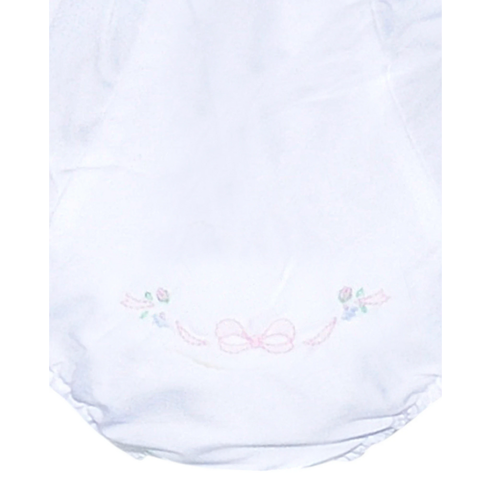 That Store white baby girl diaper cover featuring delicate pink bow and floral embroidery detailing