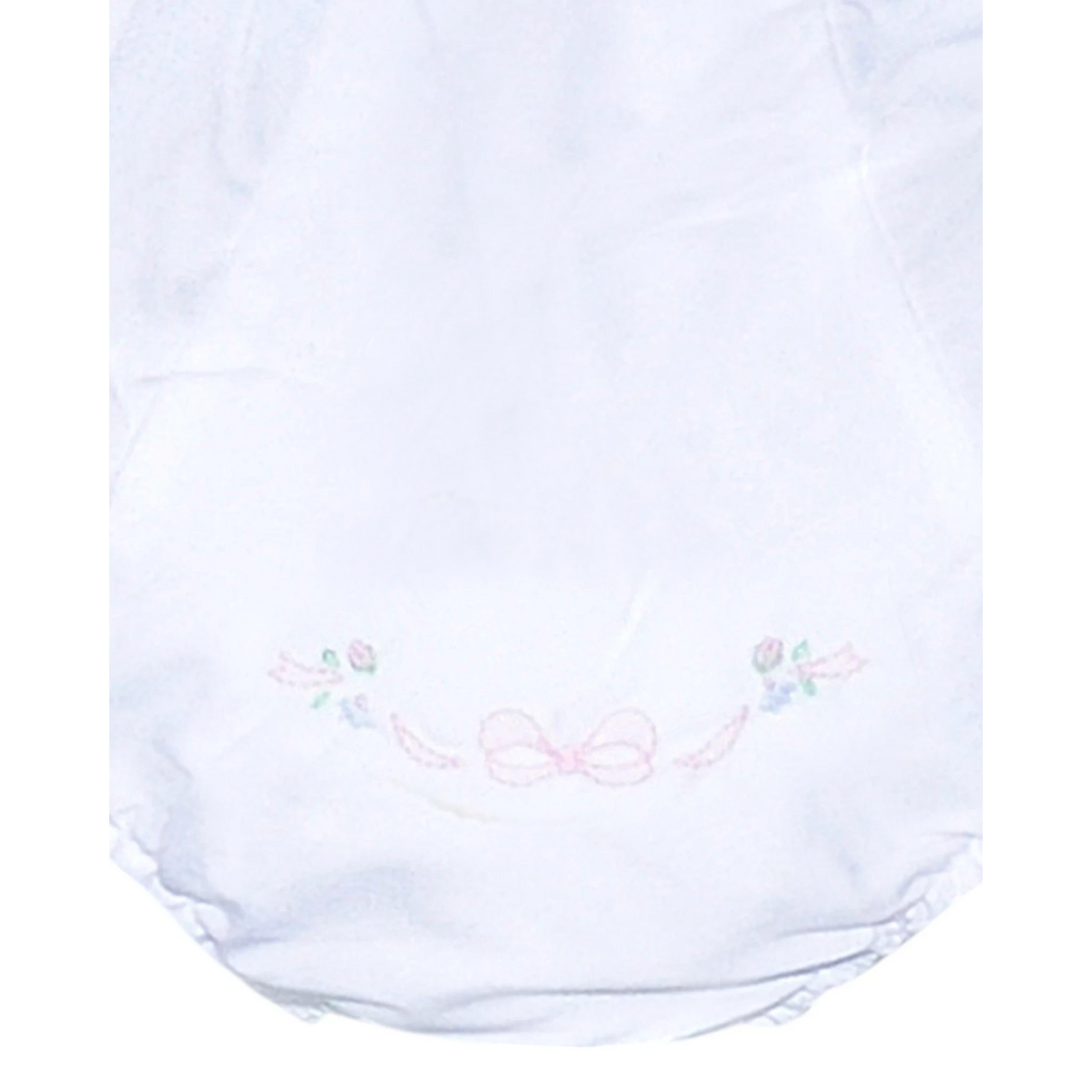 That Store white baby girl diaper cover featuring delicate pink bow and floral embroidery detailing