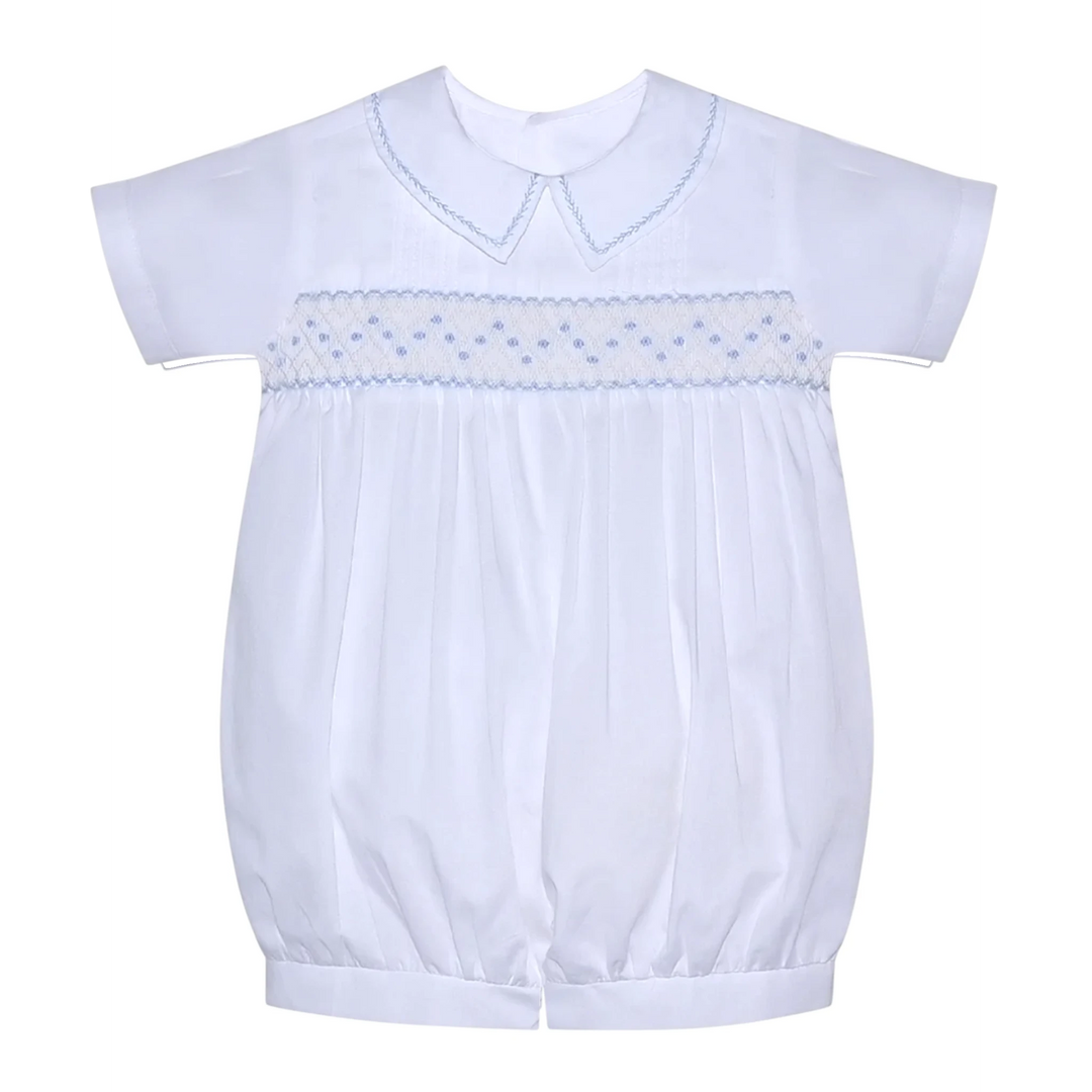 That Store white baby romper with blue geometric smocking, peter pan collar, and short sleeves for special occasions.