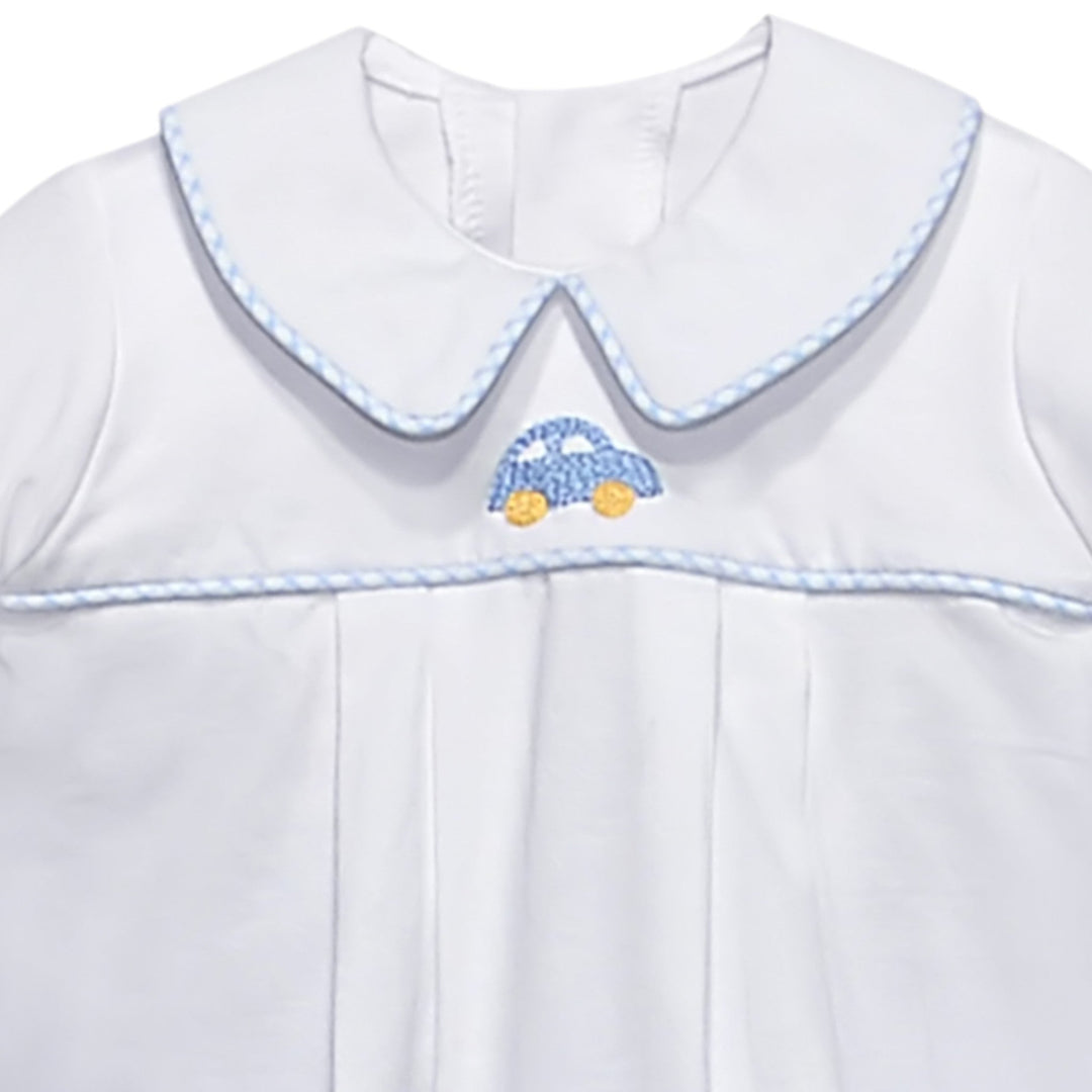 That Store white baby shirt with Peter Pan collar, blue gingham trim, and hand-embroidered blue car motif