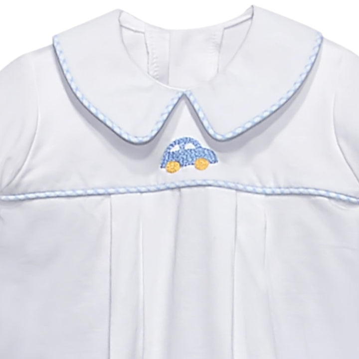 That Store white baby shirt with Peter Pan collar, blue gingham trim, and hand-embroidered blue car motif