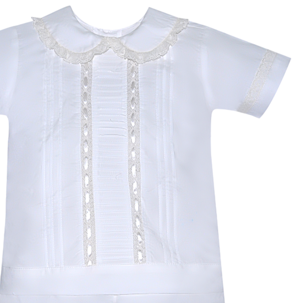 That Store white cotton batiste boys shirt with ecru lace trim, pintucks, and ribbon accents for special occasions.