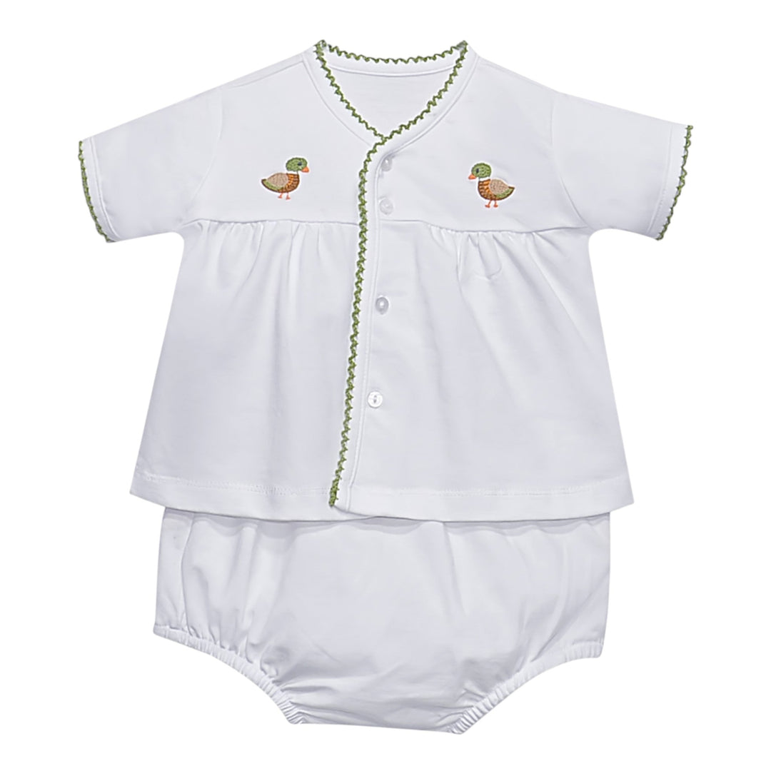 That Store white unisex diaper set with embroidered duck motifs and green scalloped trim on a button-down top.