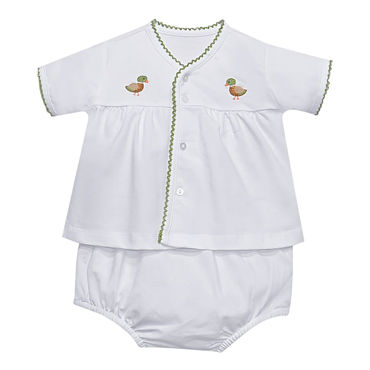 That Store white unisex diaper set with embroidered duck motifs and green scalloped trim on a button-down top.