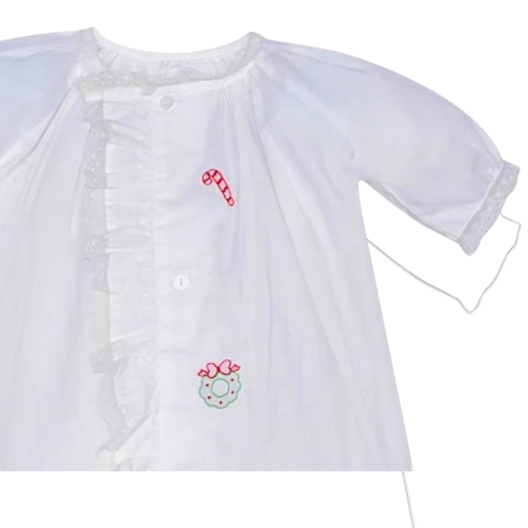 That Store white baby girls daygown with holiday embroidery, ruffled lace trim, and front button closure.