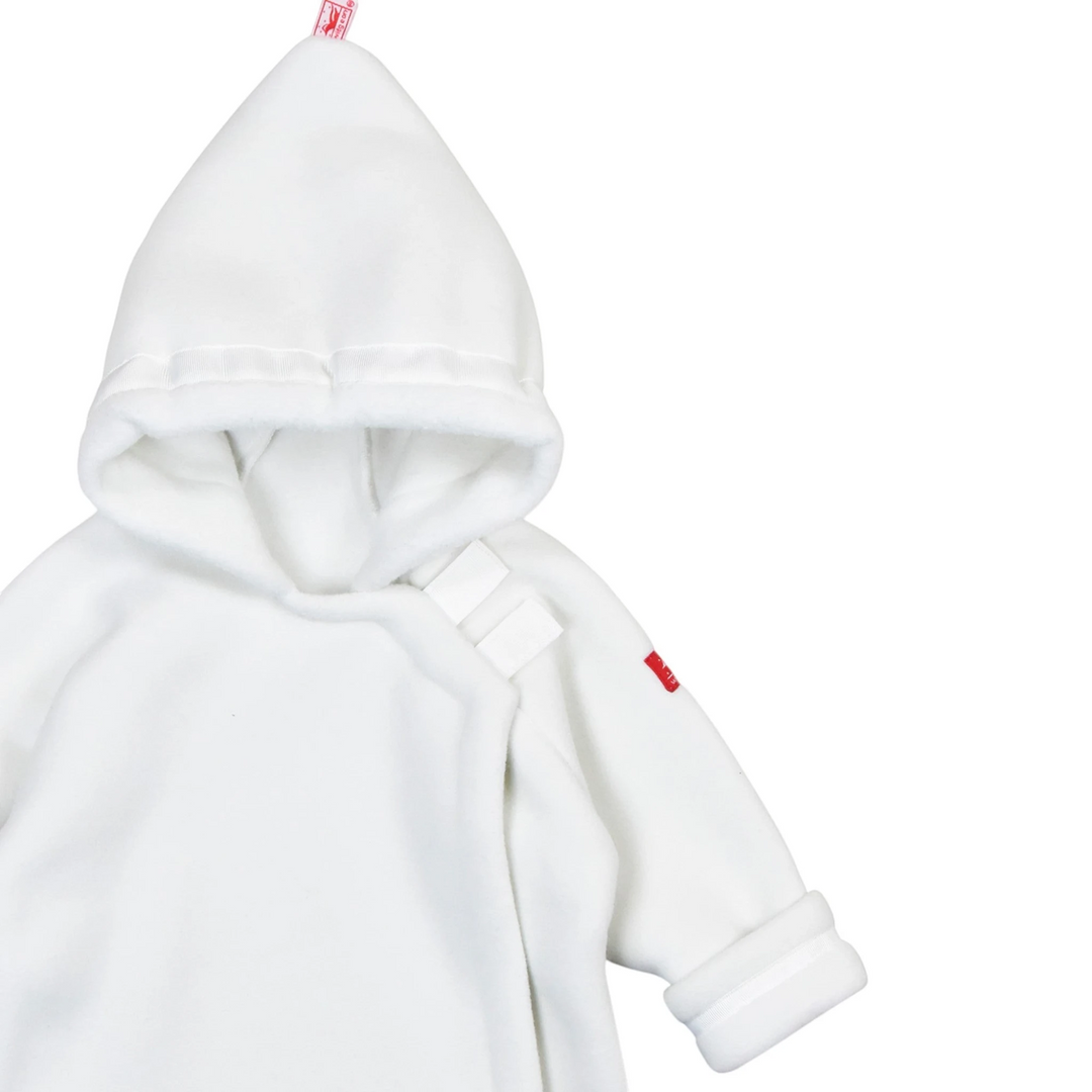 That Store white Polartec fleece infant jacket with a hooded flap-over design and adjustable grosgrain ribbon