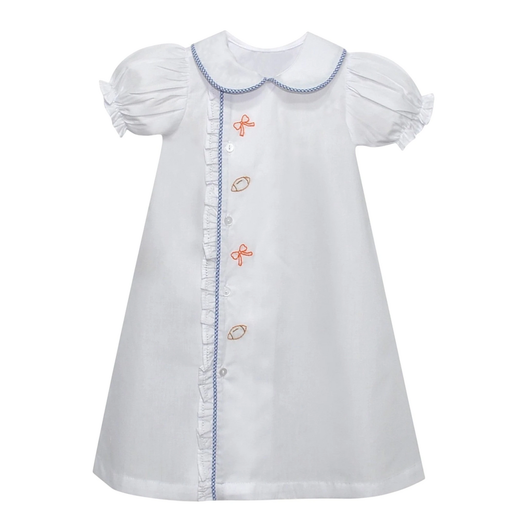 That Store white girls daygown with blue gingham trim, ruffled placket, and bow and football embroidery.