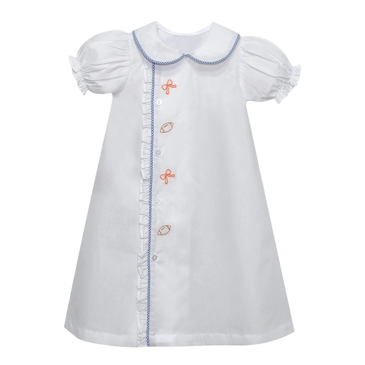 That Store white girls daygown with blue gingham trim, ruffled placket, and bow and football embroidery.