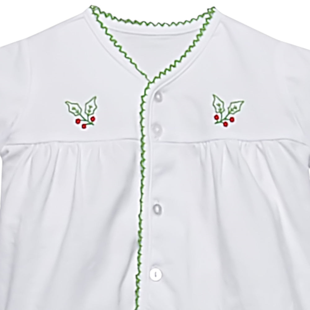 That Store white baby top with green picot trim and embroidered holly berry details on the chest