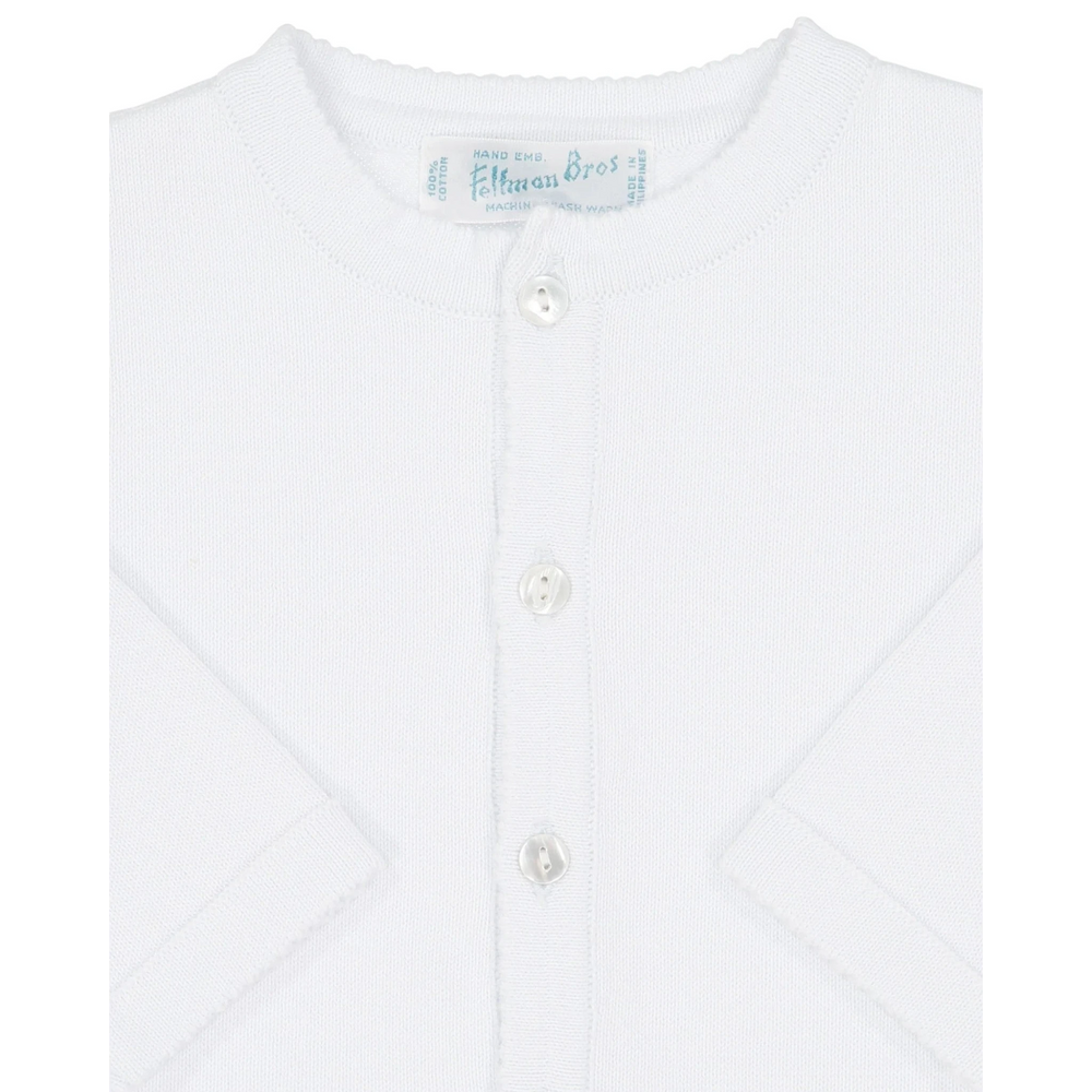 That Store white knit cardigan sweater for children made of 100% cotton with a button-down front closure
