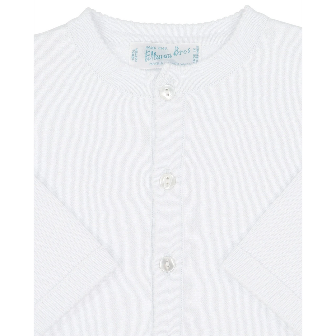 That Store white knit cardigan sweater for children made of 100% cotton with a button-down front closure