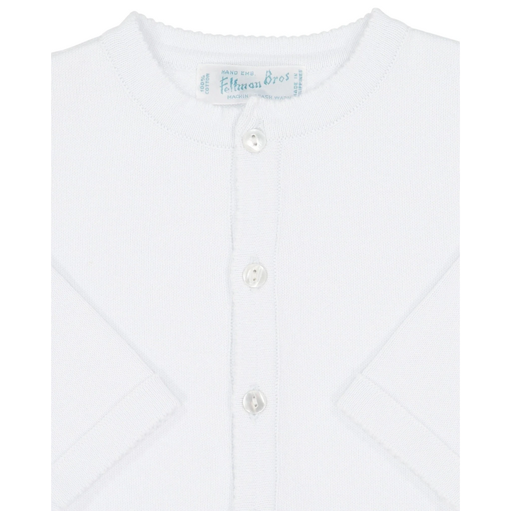 That Store white knit cardigan sweater for children made of 100% cotton with a button-down front closure