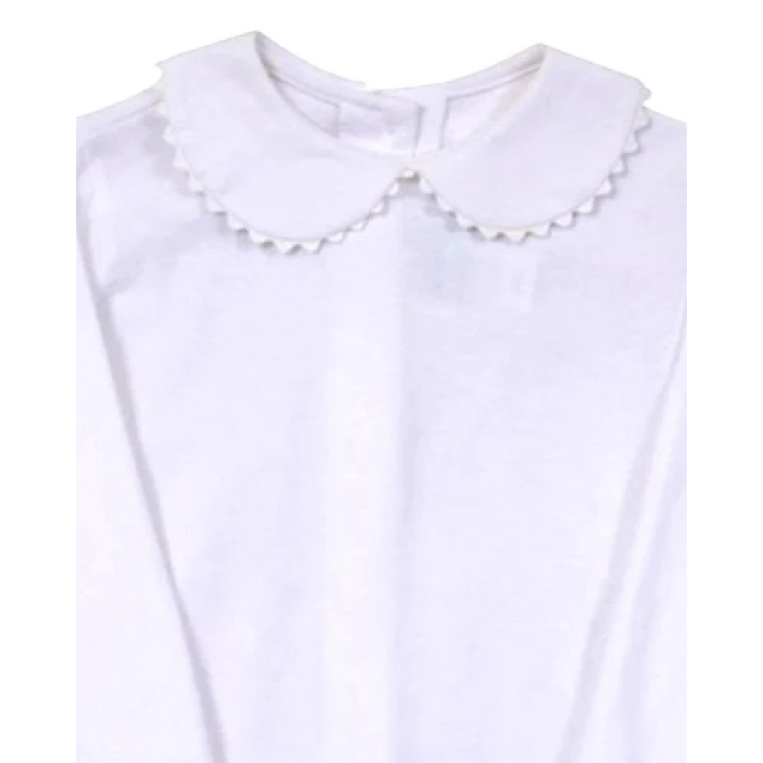 That Store white knit girls blouse featuring a round collar with delicate ric rac trim and long sleeves