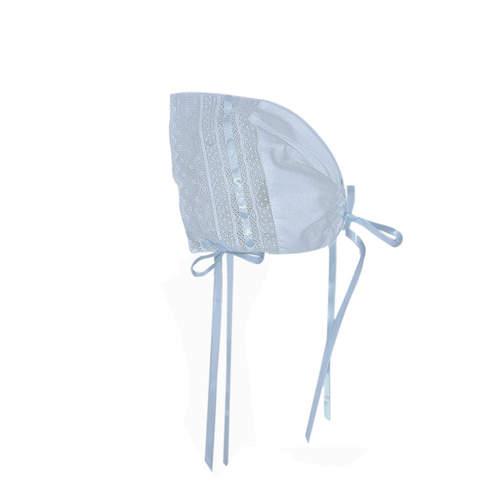 That Store white baby bonnet with delicate blue ribbon trim and intricate lace detailing for a classic heirloom look.
