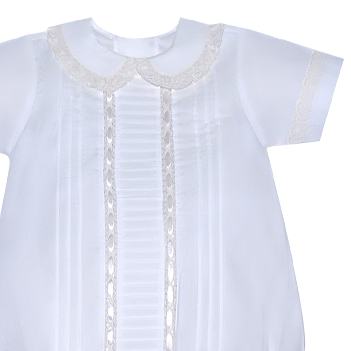 That Store white baby bubble romper featuring delicate ecru lace trim, pintuck details, and a classic Peter Pan collar.