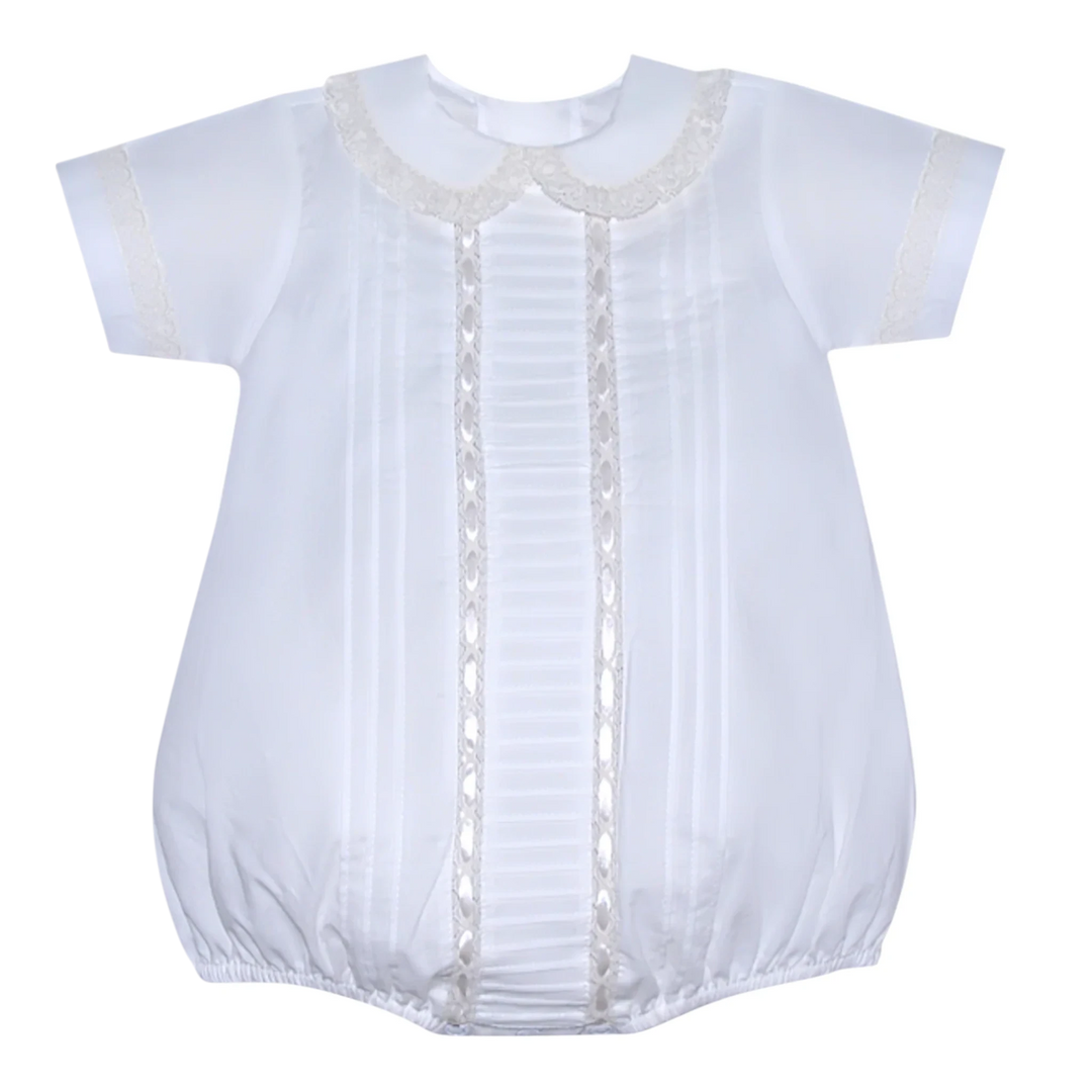 That Store white baby bubble romper featuring ecru lace trim, ribbon accents, and delicate pleats for special events.