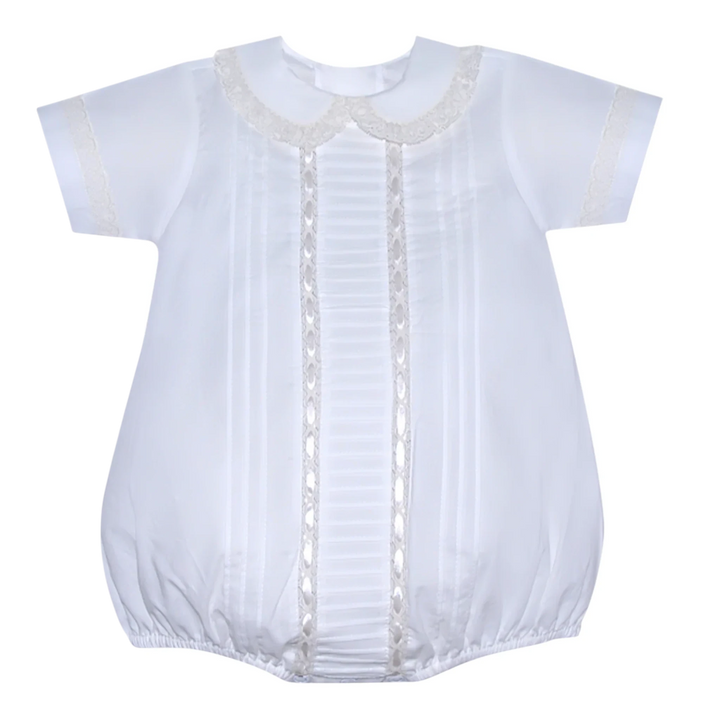 That Store white baby bubble romper featuring ecru lace trim, ribbon accents, and delicate pleats for special events.
