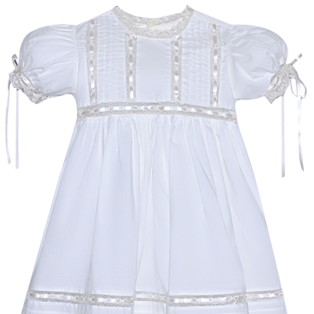 That Store Margaret heirloom white dress with ecru lace trim, satin ribbon accents, and puff sleeves for girls.