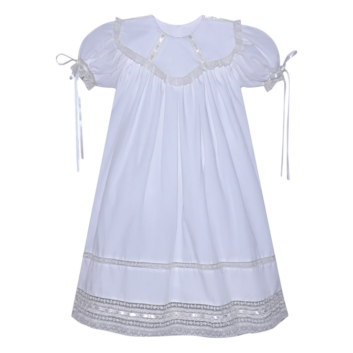 That Store white heirloom dress featuring ecru lace trim, puff sleeves with ribbons, and a classic spoke collar.