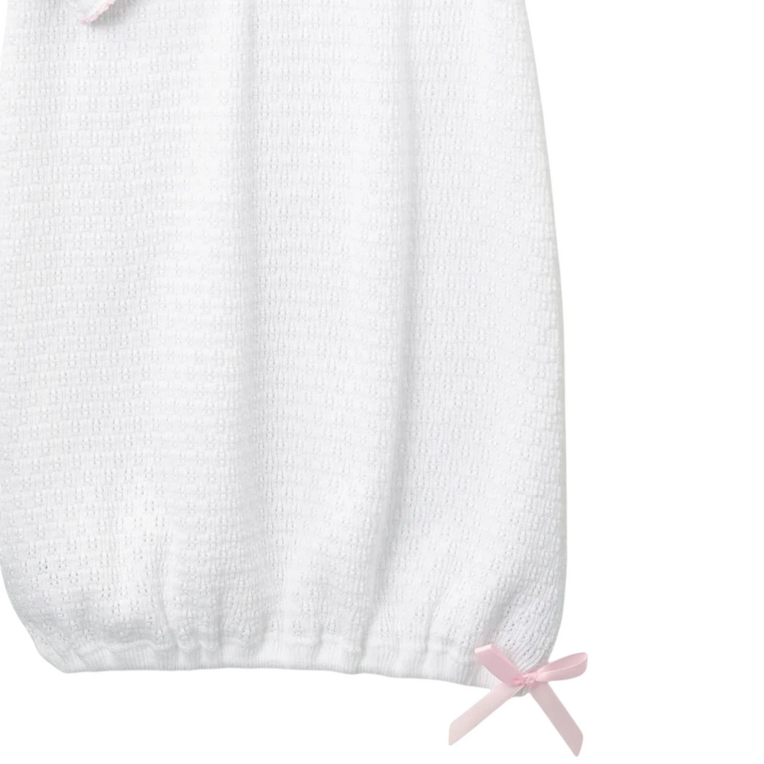 That Store Paty Knit baby gown in white cotton blend with delicate pink ribbon accents and textured knit fabric.