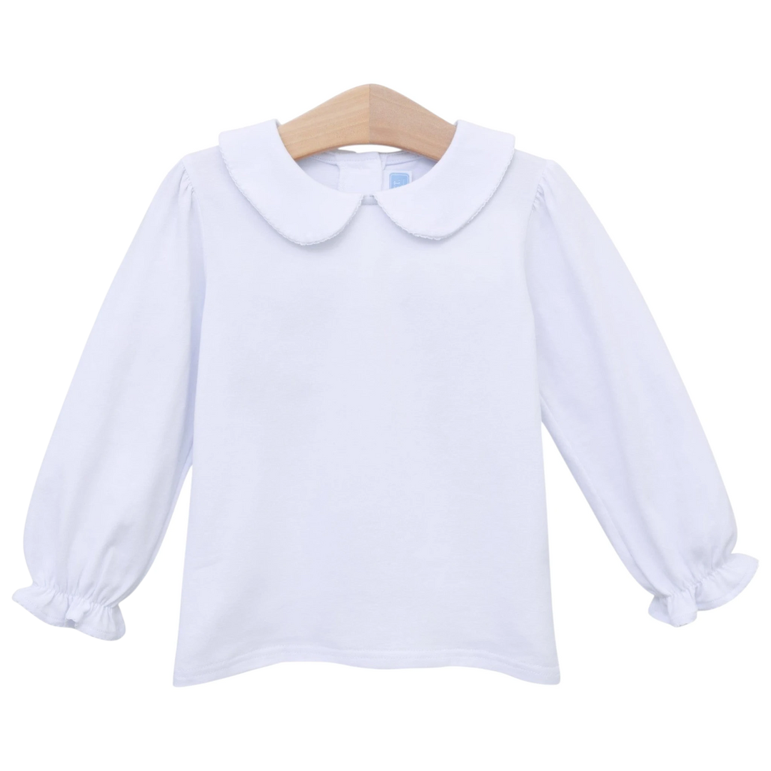 That Store white long-sleeve girls top featuring a classic Peter Pan collar and ruffled cuffs in soft cotton blend