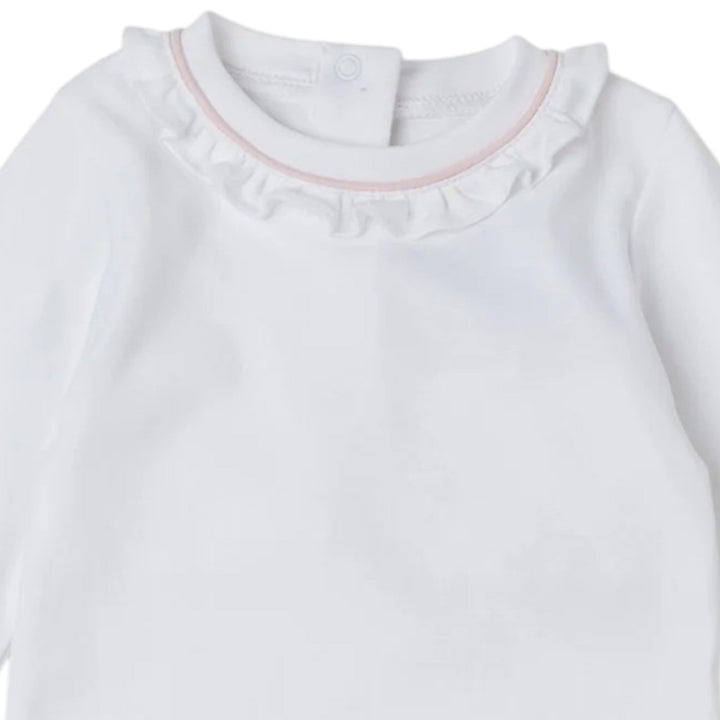 That Store white Pima cotton baby daygown with light pink piping, ruffled collar, and back snap closure.