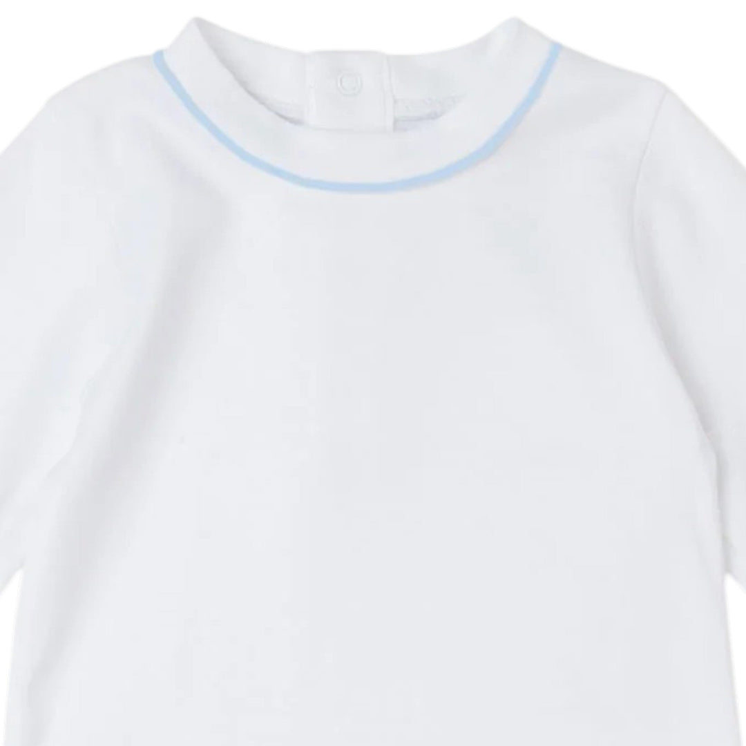 That Store white Pima cotton baby daygown featuring delicate light blue piping at the neckline and snap-back closure.