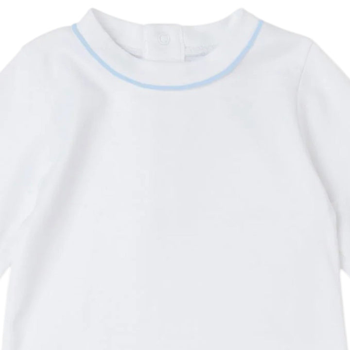 That Store white Pima cotton baby daygown featuring delicate light blue piping at the neckline and snap-back closure.