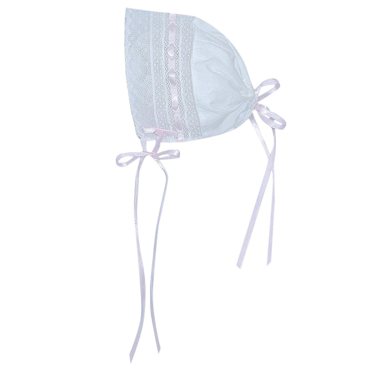That Store white baby bonnet with delicate pink ribbon accents and intricate lace trim for a vintage heirloom look.