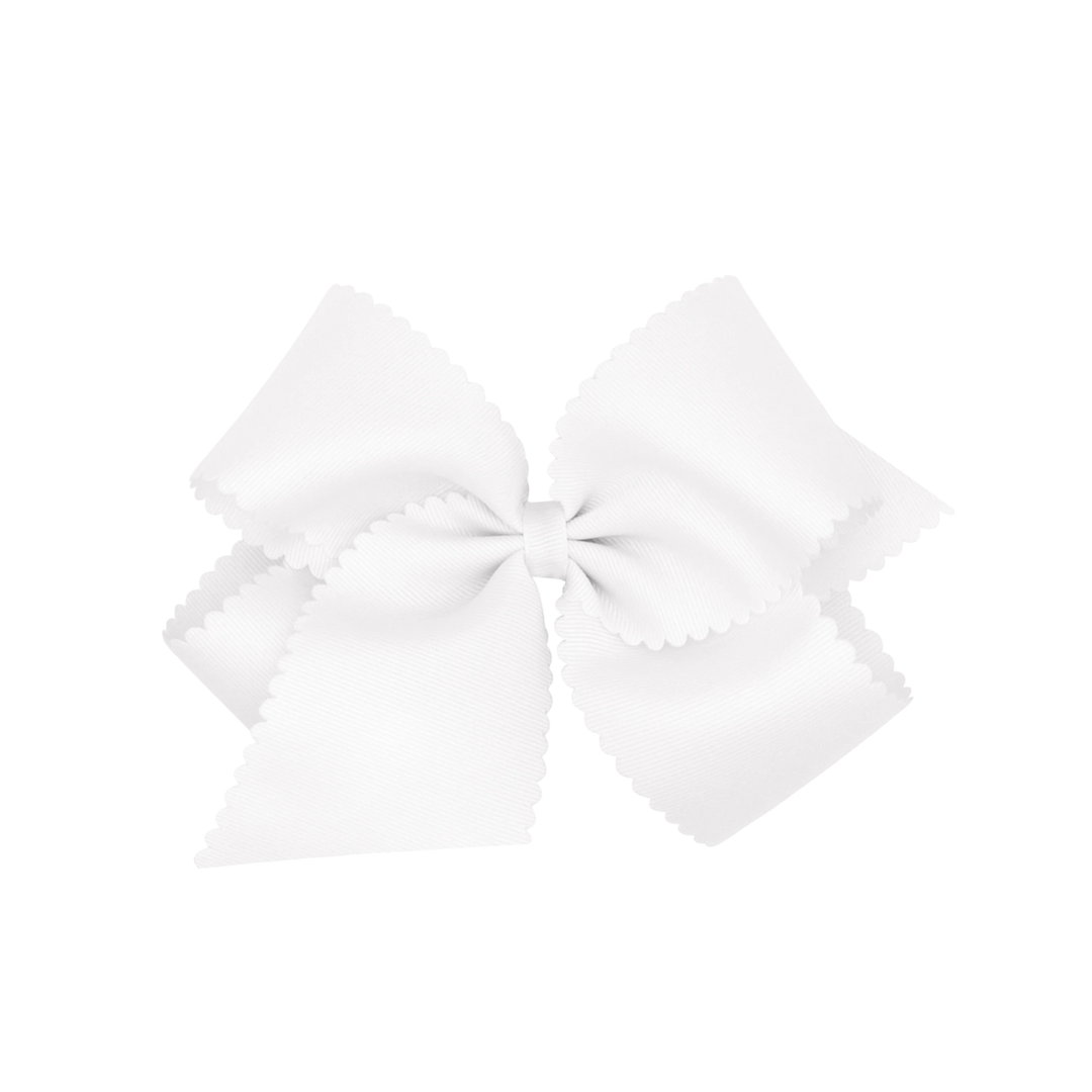 That Store white grosgrain hair bow for girls featuring a decorative scalloped edge and a secure WeeStay clip.