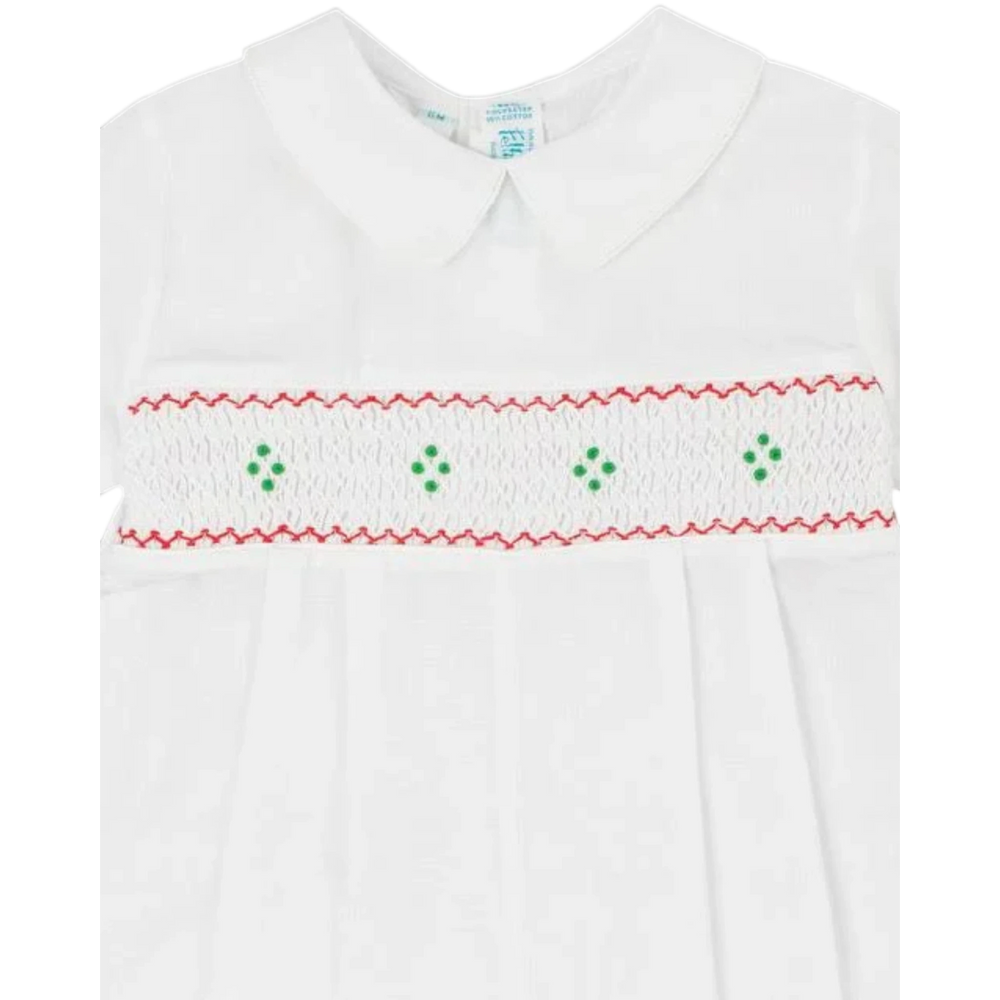 That Store white boys longall with red and green hand-smocked embroidery, pleated front, and classic peter pan collar.