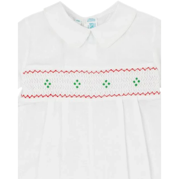 That Store white boys longall with red and green hand-smocked embroidery, pleated front, and classic peter pan collar.