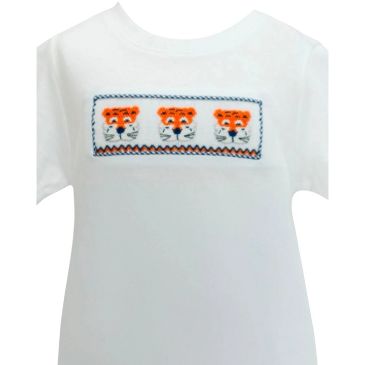 That Store white short-sleeve shirt featuring a smocked panel with three embroidered orange and navy tiger faces
