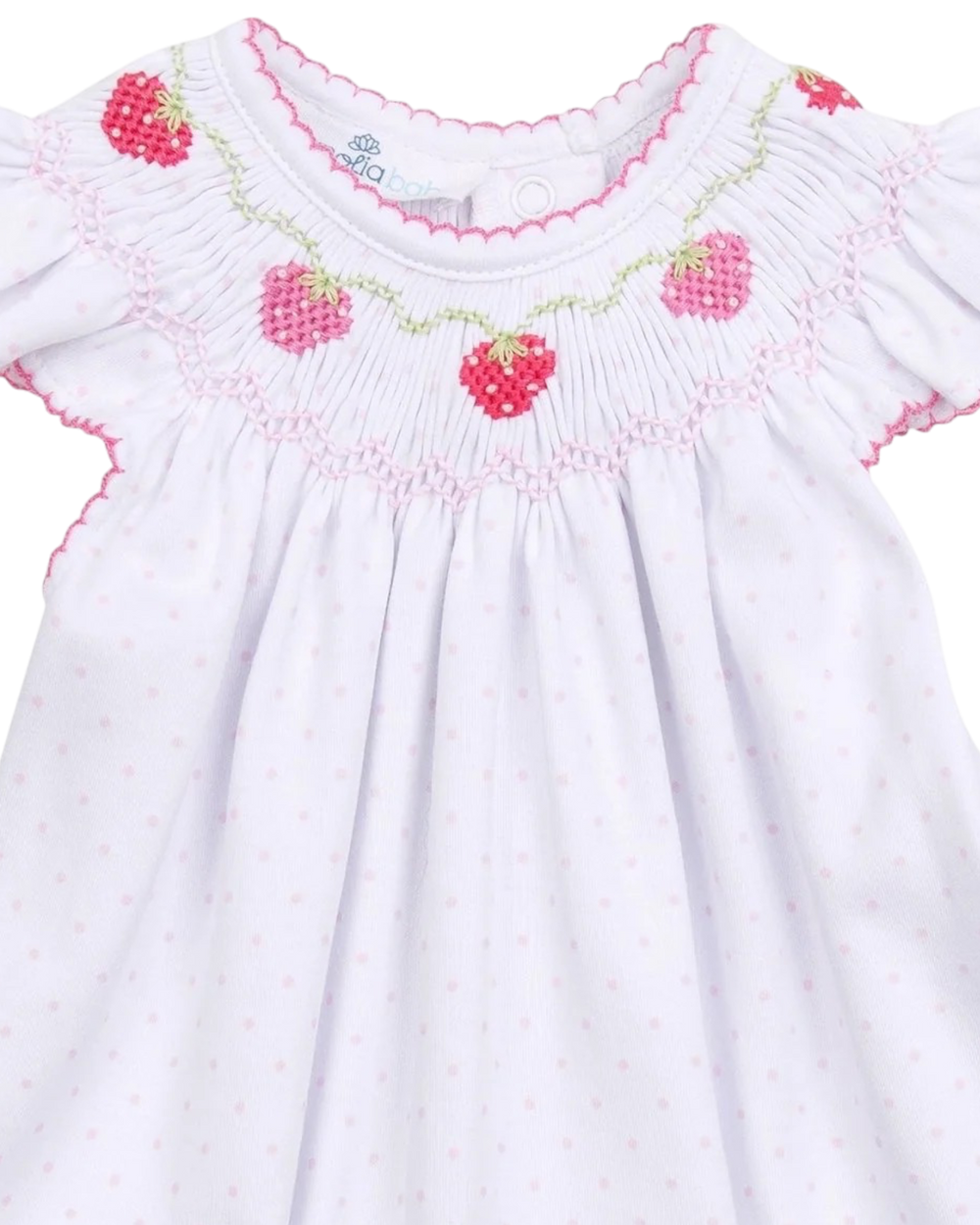 White dress with pink berry smocking  on a white background